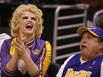 Smith and Danny DeVito clown around during a Los Angeles Lakers' game in 2004.