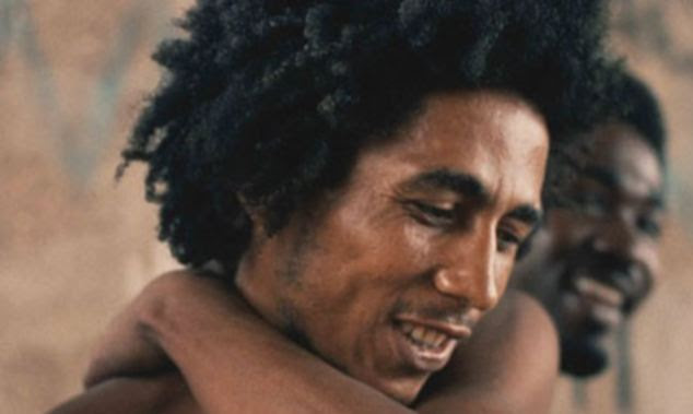 Researchers say that listening to artists such as Bob Marley (pictured) can improve our mood. they also found Prince and the Beachboys can have a similar effect