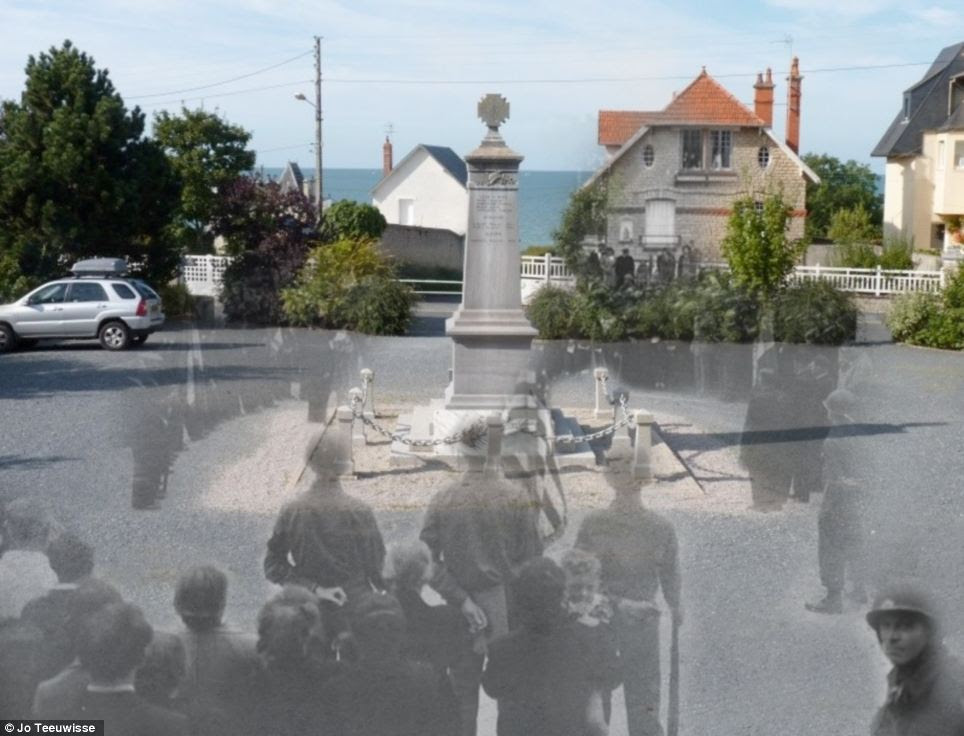 Honouring the dead: Village behind the front lines in Normandy celebrate Bastille Day for the first time in over four years at a memorial that still stands today