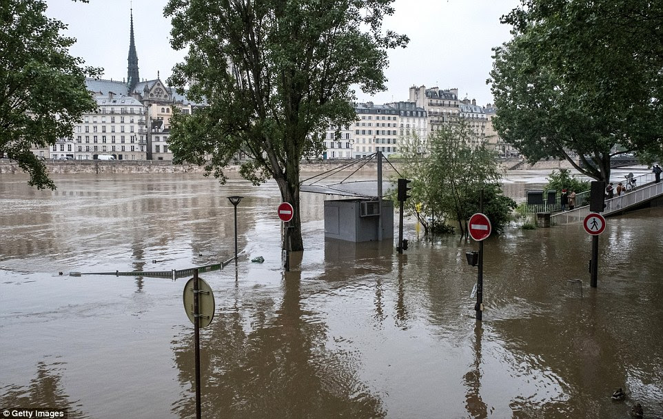 Days of torrential rain have only added to the gloomy atmosphere in France, also facing a third full day of train strikes after months of protests and political turmoil