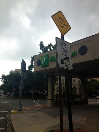 stopping way back from the intersection on a busy street.