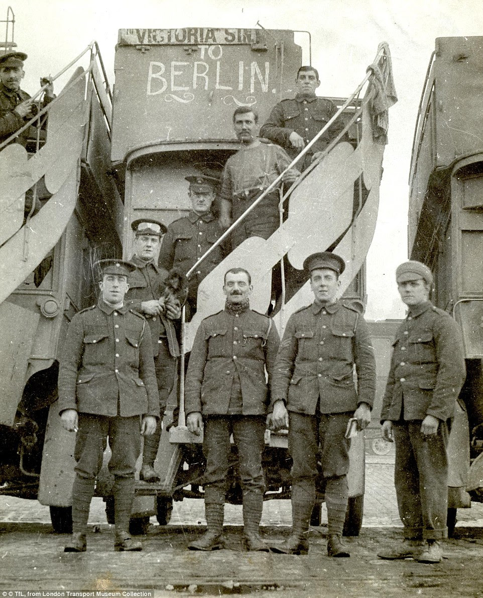 Aim: In an image taken by a press photographer in April 1915, First World War Army Service Corps drivers stand in front of a B-type bus converted for use as a troop carrier, with the destination board reading ‘To Berlin’