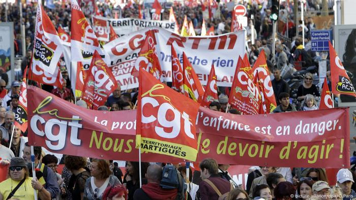 Protesters called Macron the lapdog of an employer's group