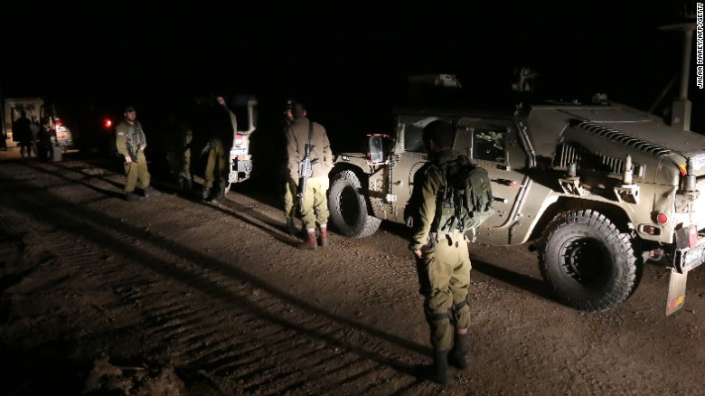 Israeli soldiers patrol the Golan Heights after airstrikes killed militants allegedly trying to plant a bomb.