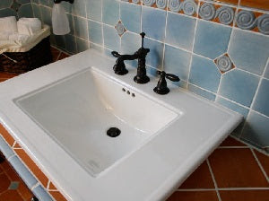Brushed Blue Field Tile with Sprial accent dots and create this Bathroom backsplash Brushed Blue Field Tile with Sprial accent dots and create this Bathroom backsplash