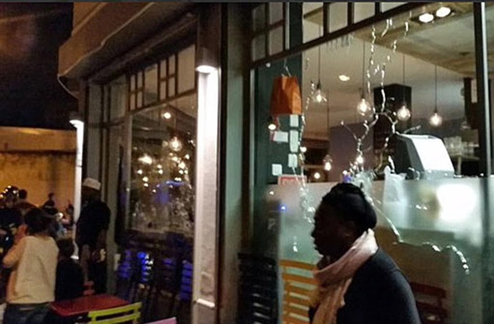 Images posted online showed the cracked windows of what appeared to be the restaurant under attack
