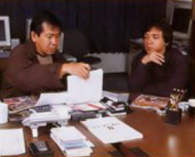 Yu Suzuki and Keiji Okayasu