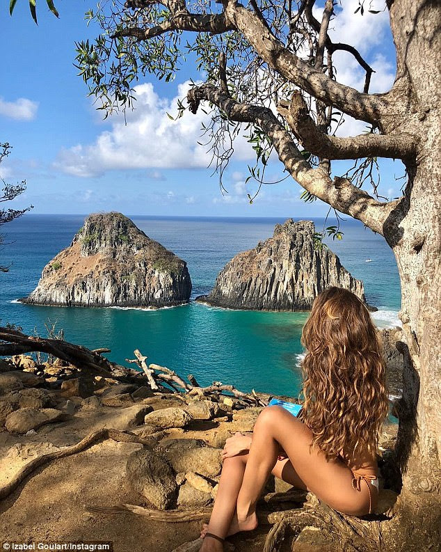 Merry Christmas: The sportsman photographed Izabel in a beautiful spot on the island