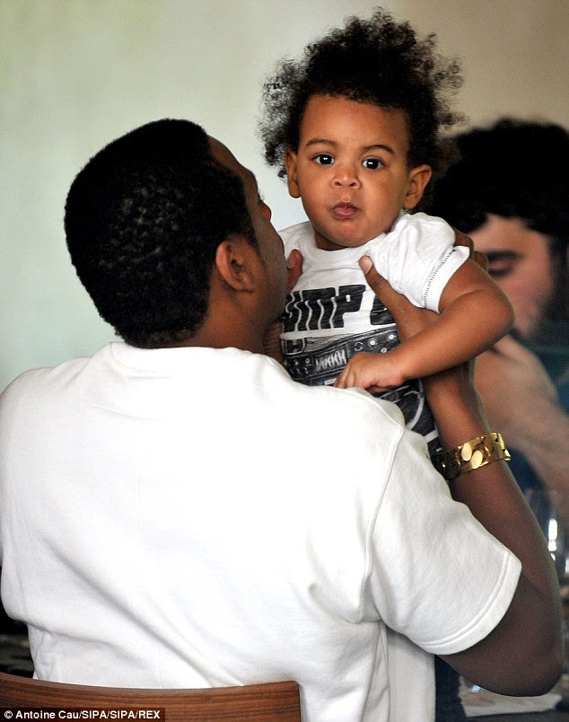 Better haircare: A petition has been launched asking Beyonce and Jay Z to comb their two-year-old daughter Blue Ivy's hair (pictured in April 2013)