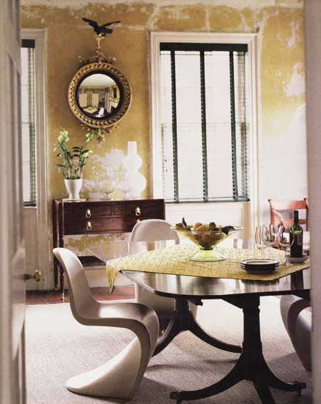 Dining-room-designed-and-furnished-with-extravagant-chairs-and-wooden-table