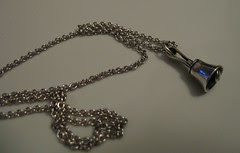 Handbell necklace
