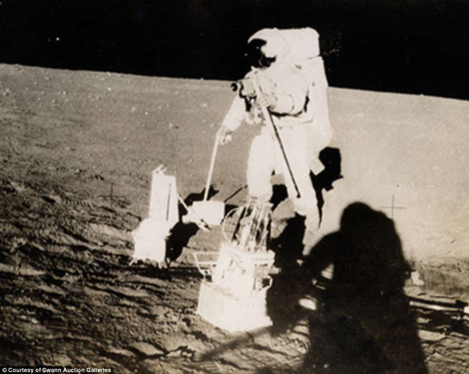 Pictured is one of the Apollo 12 astronauts placing part of the Apollo lunar Scientific Experiments Package on the lunar surface during the first of two trips out of the lunar module. Apollo was the Nasa program that launched in 1961 and got man on the moon