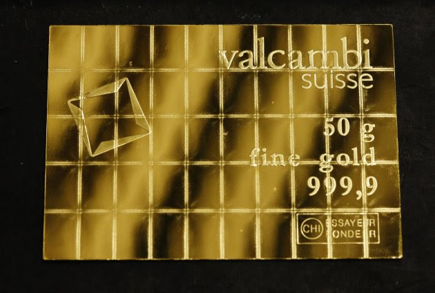 A gold Combibar is seen at a plant of gold refiner and bar manufacturer Valcambi SA in the southern Swiss town of Balerna