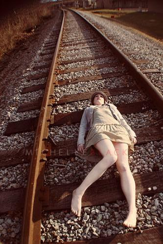 Woman on tracks