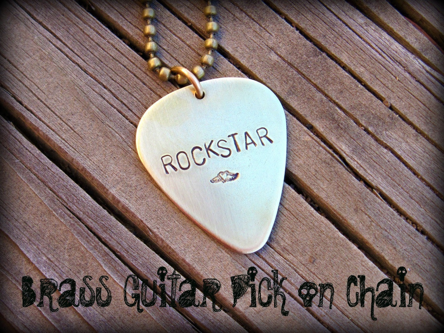 The Isaac - Nickel Silver, Brass or Copper Rocker Guitar Pick (qty 1) - Customize