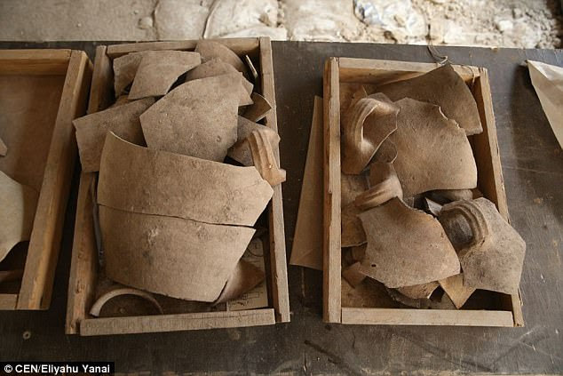 Archaeologists have found evidence that the Babylonians were responsible for the burning of Jerusalem more than 2,600 years ago. The researchers discovered charred wood, grape seeds, fish scales, bones and pottery (pictured) along with numerous other artefact