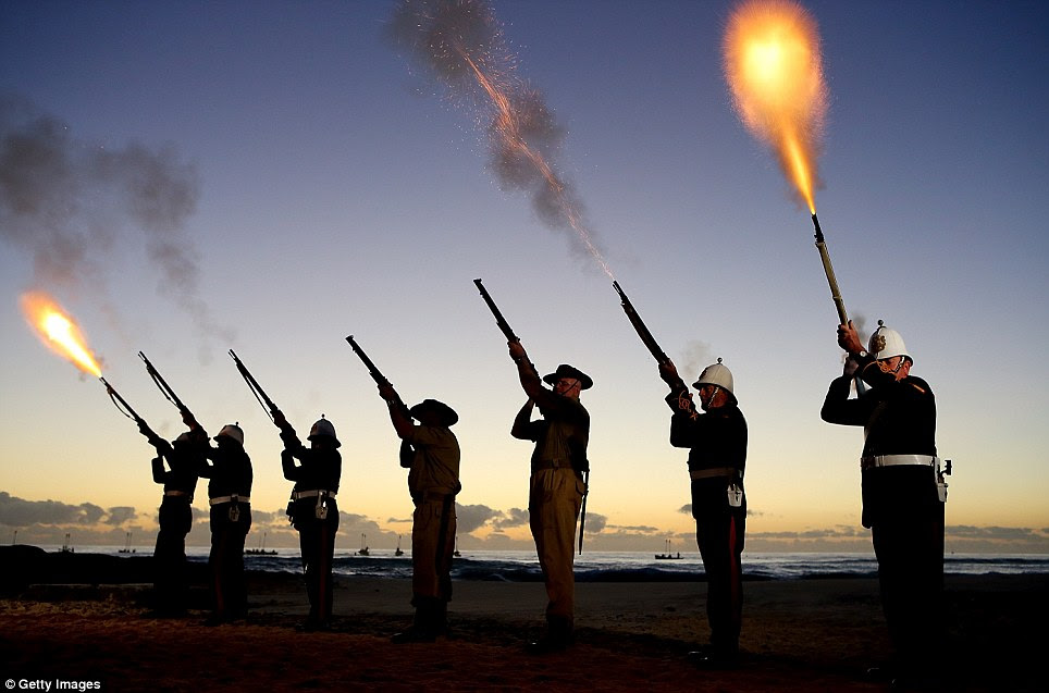 For the fallen: Members of the Albert Battery shoot a volley of fire during the ANZAC dawn service at Currumbin Surf Life Saving Club on April 25, 2014 in the Gold Coast, Australia