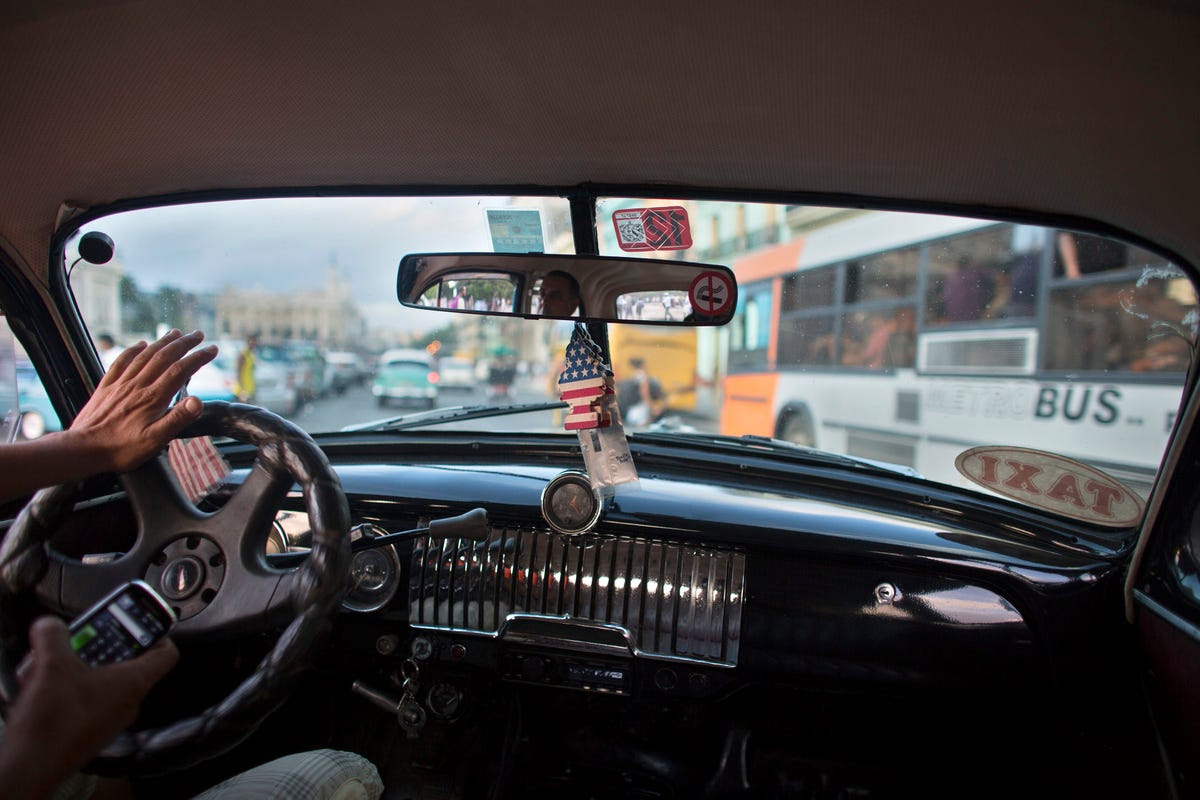 Even taxi drivers cruise around in these elaborate vehicles.