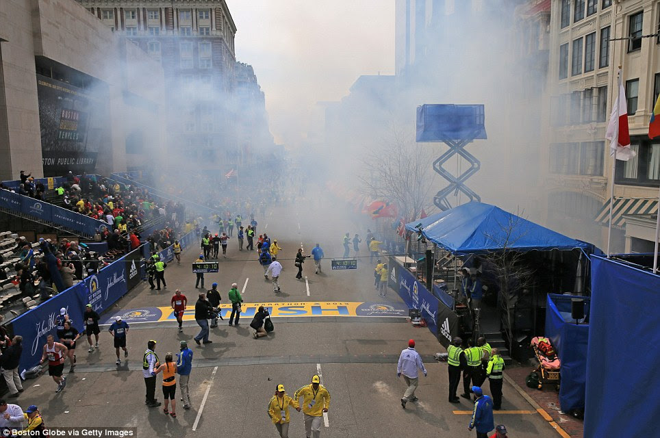 Initial devastation: Two explosions went off near the finish line of the 117th Boston Marathon today