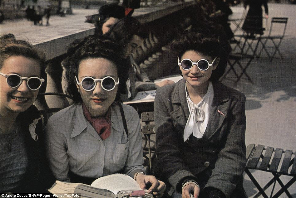 Controversial: Andre Zucca's series of photographs, such as these young women posing in unusual sunglasses