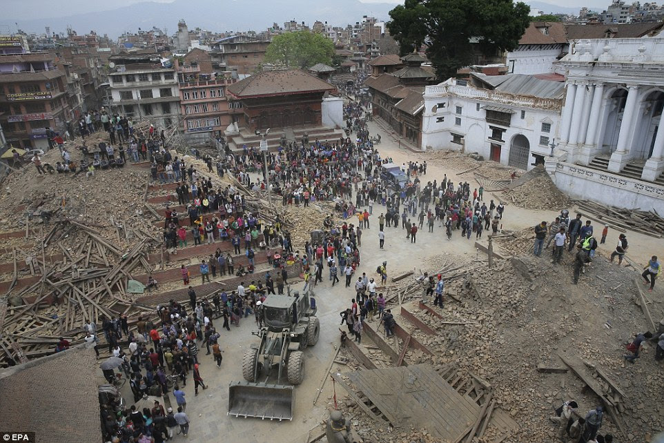 After: The square is now piled with rubble after tall temples were brought down by the force of the earthquake