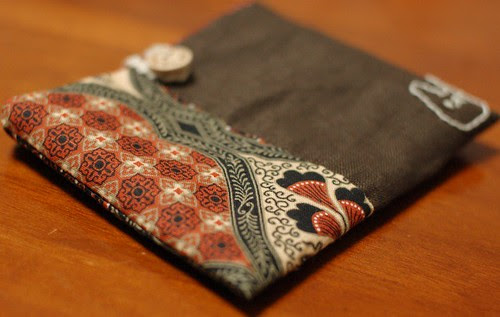 A button pouch with two pockets