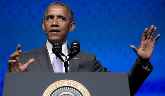 President Barack Obama gestures as he speaks to the Catholic Hospital Association Conference at the Washington Marriott Wardman Park in Washington, Tuesday, June 9, 2015.  Obama declared that his 5-year-old health care law is firmly established as the &quot;reality&quot; of health care in America, even as he awaits a Supreme Court ruling that could undermine it. (AP Photo/Carolyn Kaster)