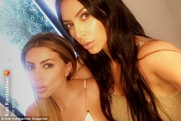 Pout and about:Â The 42-year-old Real Housewives Of Miami star also posed for photos alongside Kourtney's sister, Kim