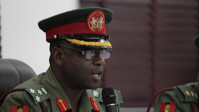 Brigadier General Musa Sani Yusuf, Chairman of the board of the General Court-martial, speak at the opening session of the general court-martial session in Abuja