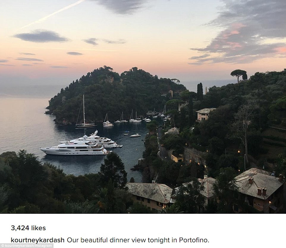 Not bad: Kourtney showed off their amazing view as the family dined in Portofino