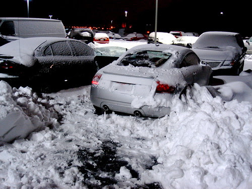 Car buried in snow
