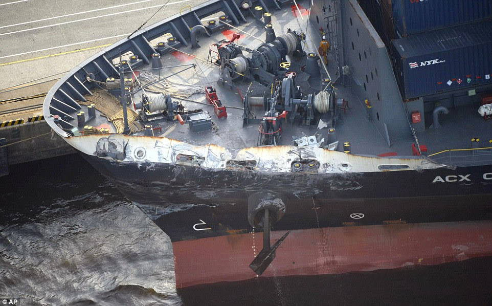The navy is investigating the possibility that some of the men who died aboard the USS Fitzgerald when it was hit by the ACX Crystal (pictured) were trapped in their rapidly flooding sleeping quarters by emergency hatches