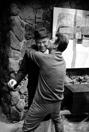 "C'mere, you big lug!" Transman, in an uncharacteristic display of affection hugs his brother-in-law, played by Frank Sinatra. "Let go of me or I will crush this cigarette out in your ear!" B-I-L says.