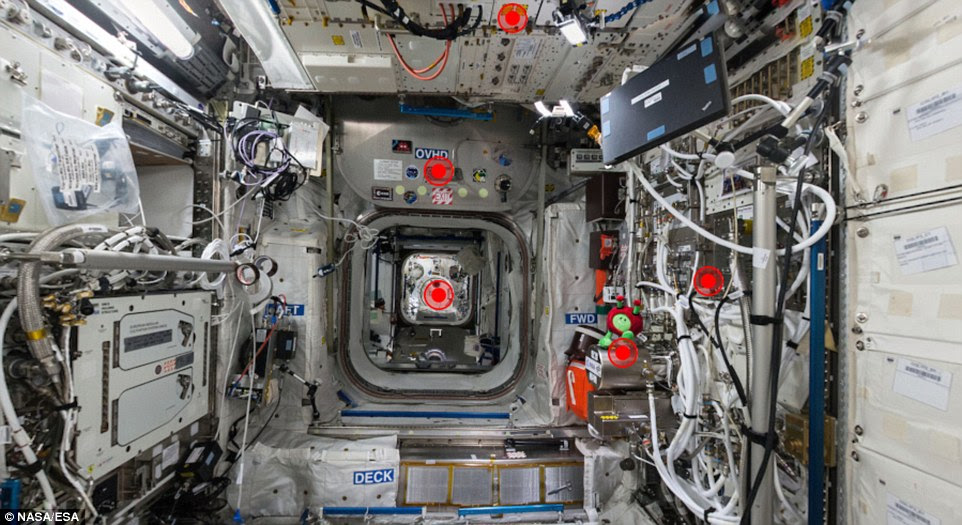 Through the hatch in the distance can be seen the Japanese Kibo module, where up to four astronauts can perform experimental activities. Above this opening is the Columbus hatch, which separates the module in which the photo was taken from the rest of the ISS Through the hatch in the distance can be seen the Japanese Kibo module, where up to four astronauts can perform experimental activities. Above this opening is the Columbus hatch, which separates the module in which the photo was taken from the rest of the ISS