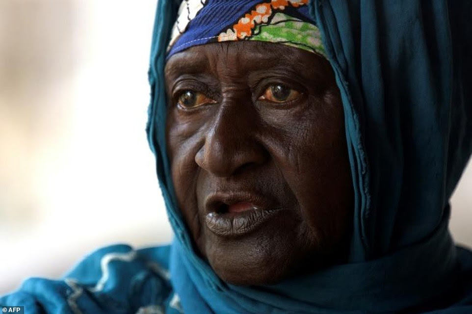 Mariama Fofana, believed to be an eighth-generation descendent of Kunta Kinte, sits in her home in Juffureh in The Gambia