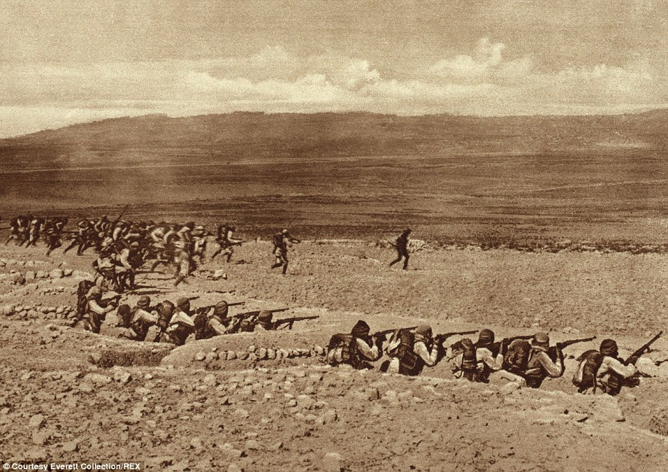 Turkish troops pictured leaving their trenches to charge into battle with French and British troops in the early stages of the Gallipoli campaign in 1915