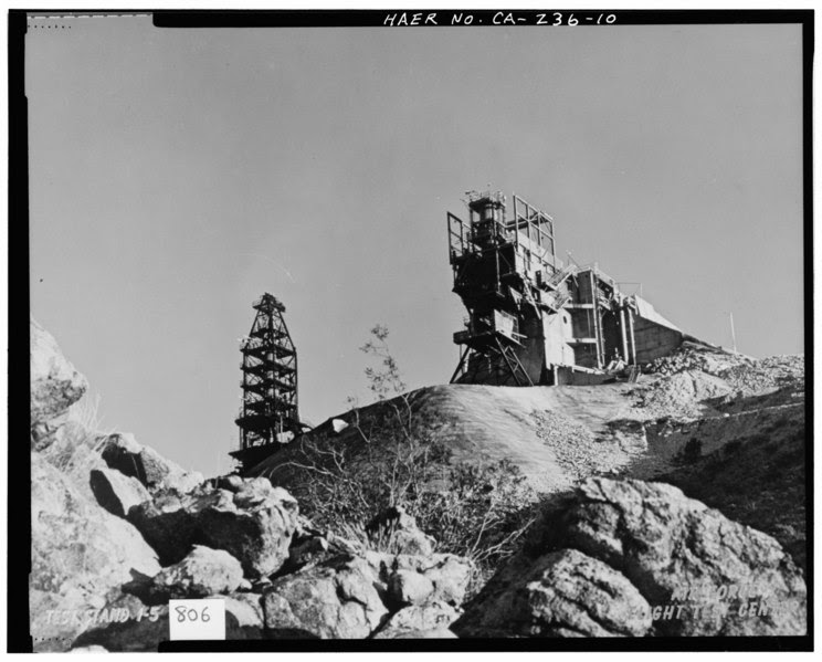 File:"TEST STAND 1-5, AIR FORCE FLIGHT TEST CENTER." ca. 1958. Test Area 1-115. Original is a color print, showing Test Stand 1-5 from below, also showing the HAER CAL,15-BORON.V,4-10.tif