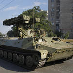 Russia sends tanks and troops into Ukraine, seizes a strategic town