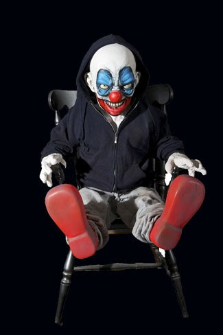 evil clown dolls sitting in chairs    I know this is old school but ever since Poltergeist I've had a fear of ugly/creepy/evil clown dolls (or ANY clown doll for that matter) sitting in a chair...especially a rocking chair!  I don't have a fear of clowns...as long as they smile, look happy and keep STANDING!