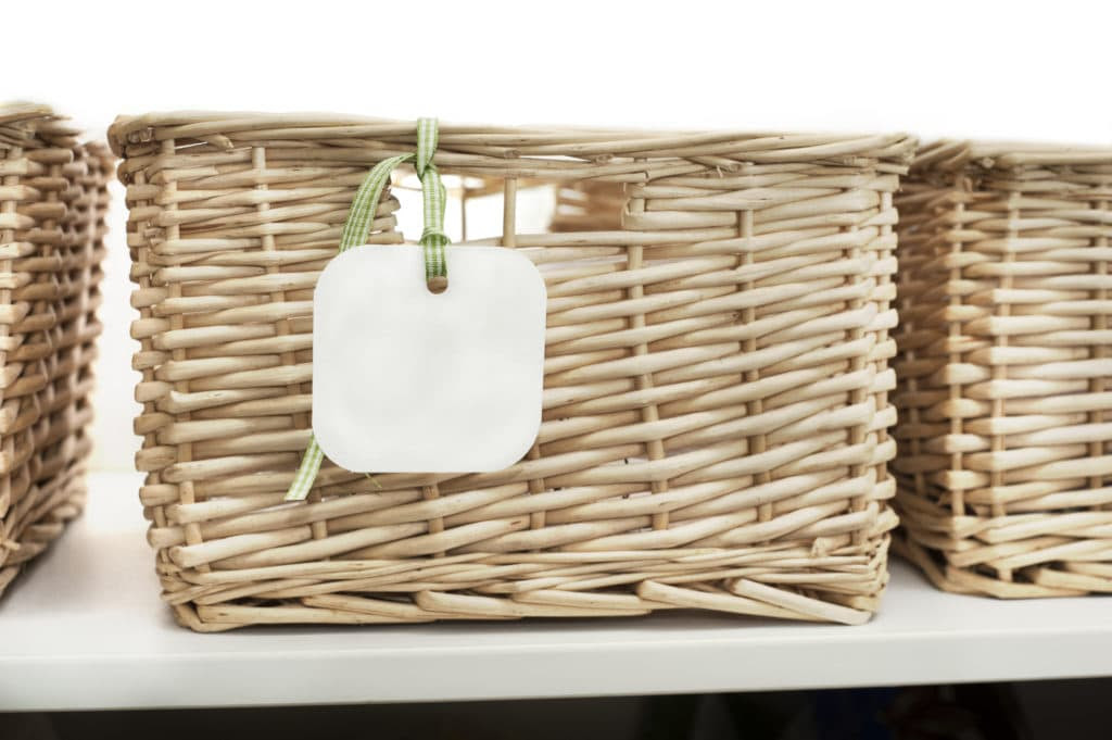 Storage basket with tag
