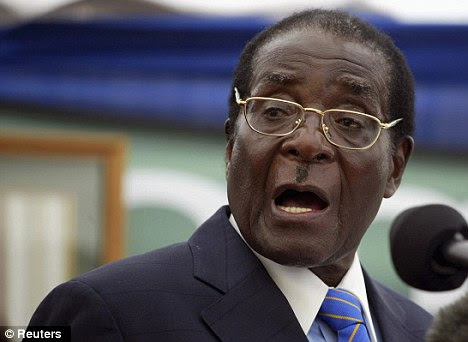 Shocking: A Zimbabwean politician has said women should be forced to bathe less and shave off their hair to help curb the spread of HIV. Senator Morgan Femai is in the country's main opposition party to President Robert Mugabe, pictured