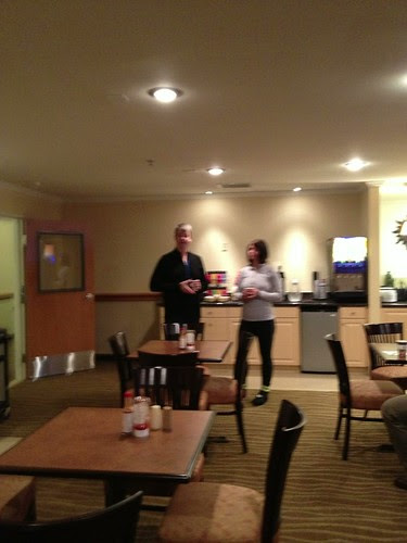 Charlie and Kathy fuzzily getting breakfast before the ride