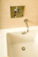 how to unclog a bathtub drain with standing water