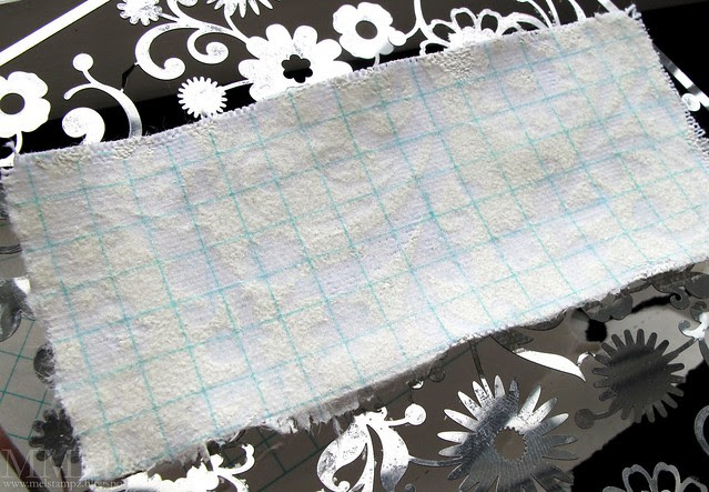 Vanilla Embossing on sticky back canvas with vintage graph paper transfer