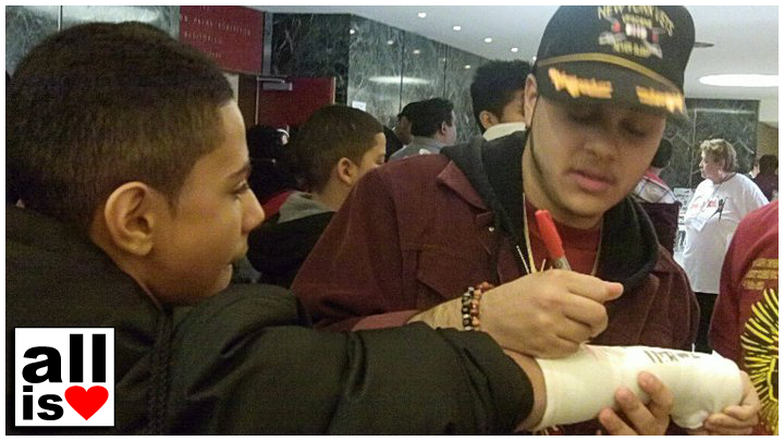 signing autographs