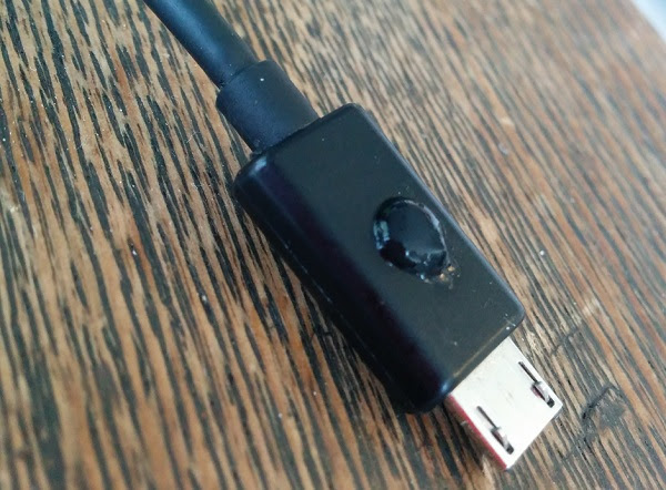 Super glue a dot on your phone charger so at night you don't fumble around like a fool.