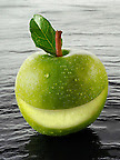 Wole Granny Smith apple  with a smiley face
