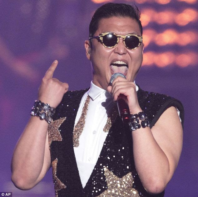 Success: South Korean rapper Psy, who sings the popular Gangnam Style song, performs during his concert in Seoul earlier this week