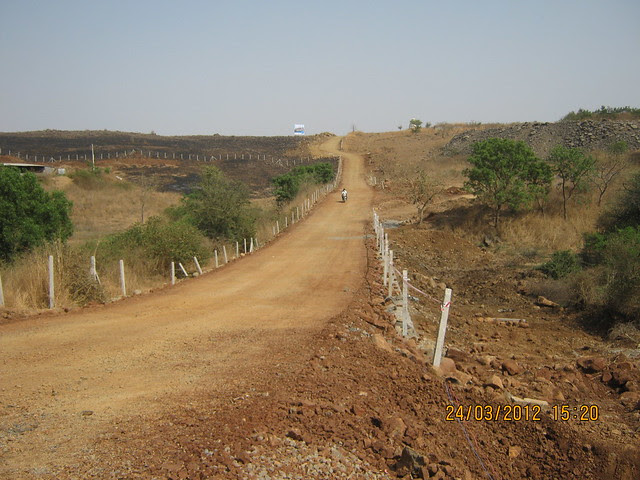 Kaccha R P Road to Vascon Nature Springs Villas Row Houses 2 BHK & 3 BHK Flats & Vascon Nature's Nest 1 BHK 1.5 BHK & 2 BHK Flats at Varale near Talegaon Dabhade Taluka Maval District Pune 410 507