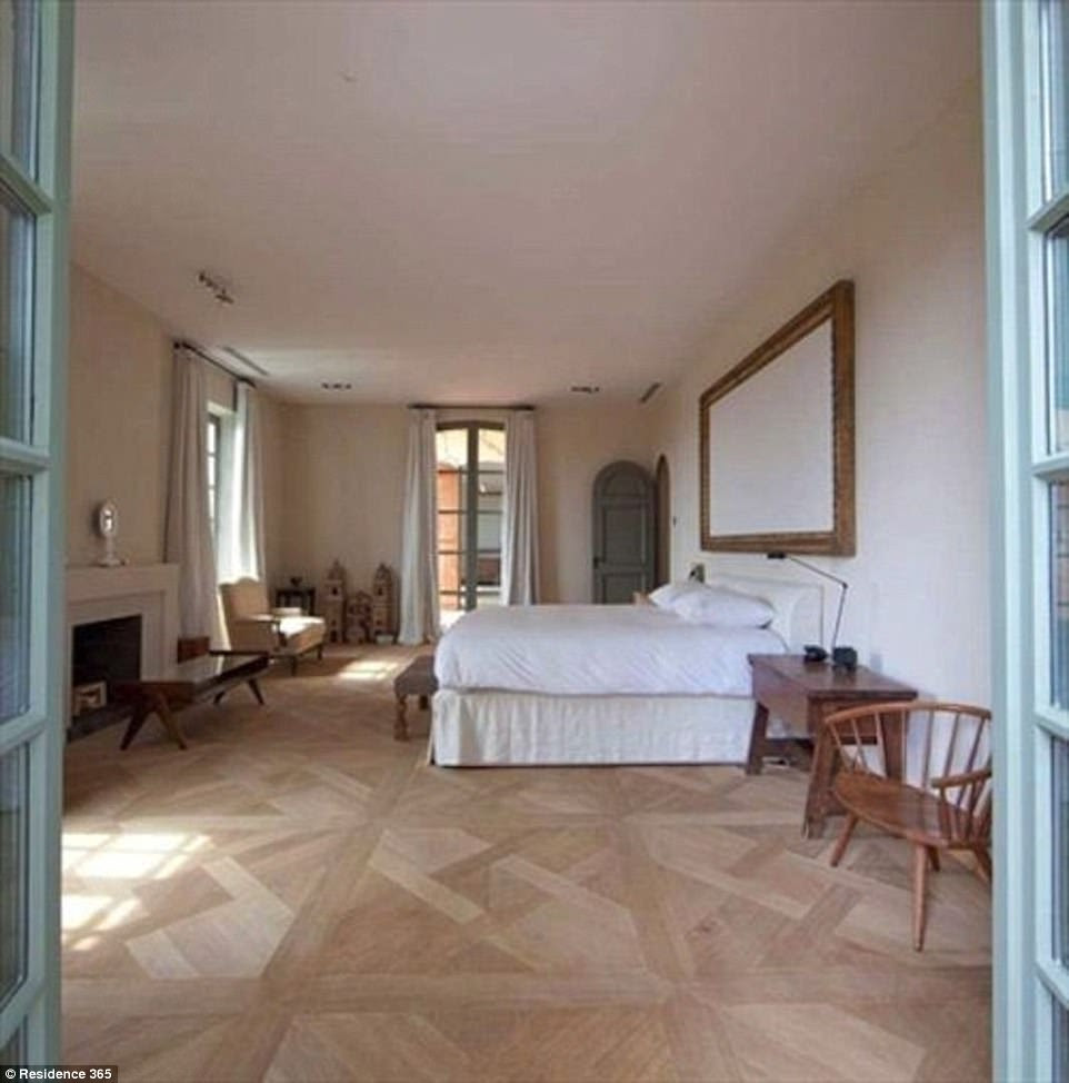 Plenty of space: One of the four guest bedrooms in the specious main building on the French Riviera
